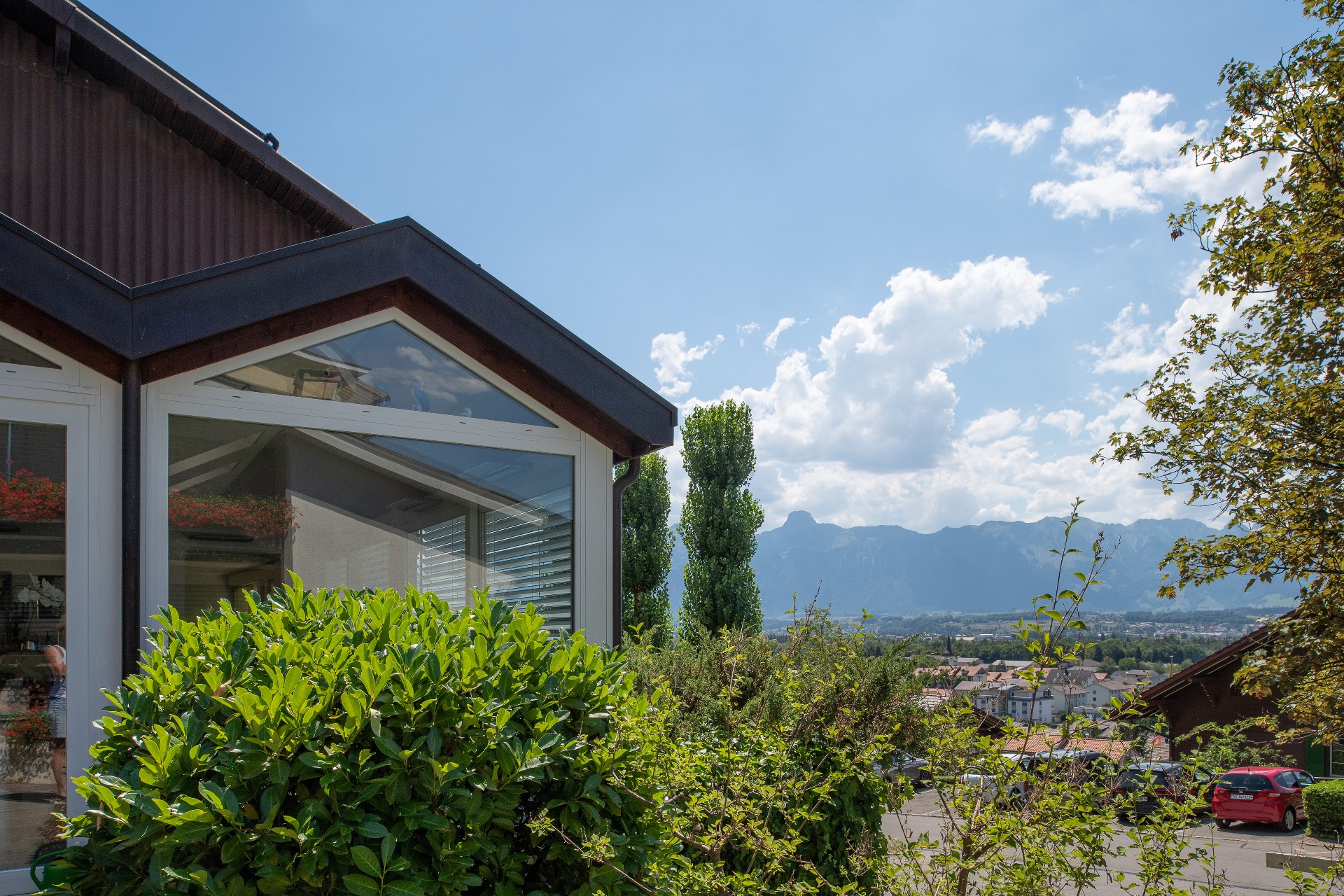Aussenaufnahme Haus und Wolken